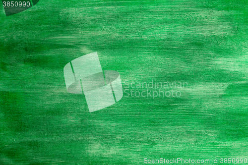 Image of Green painted artistic canvas