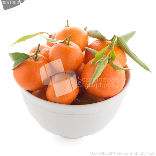 Image of Tangerines on ceramic white bowl 