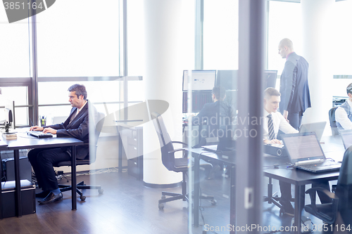 Image of Business people in modern office.