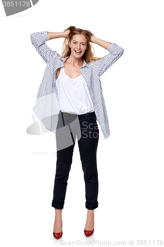 Image of Woman in full length happy smiling laughing