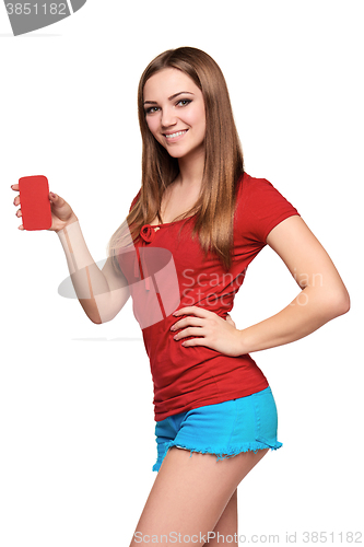 Image of smiling teen girl holding blank credit card