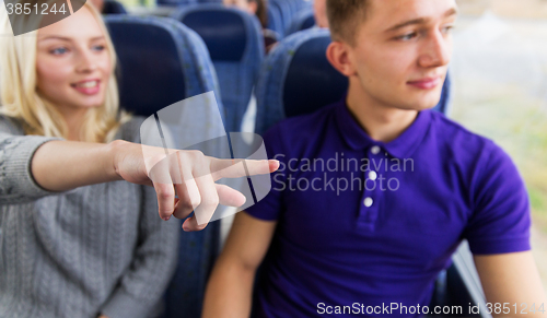 Image of close up of young couple driving in travel bus