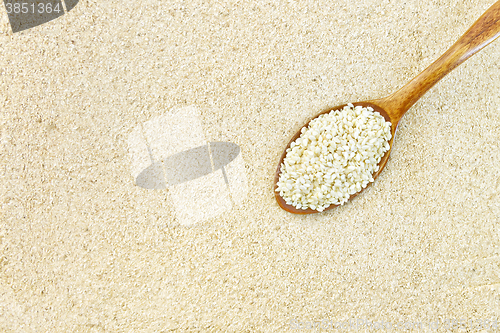 Image of Flour sesame with seeds in spoon