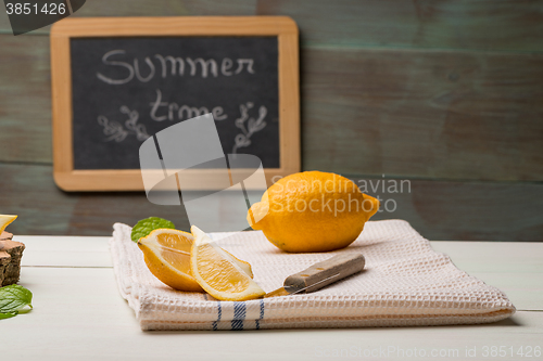 Image of Lemon and lime slices in jars