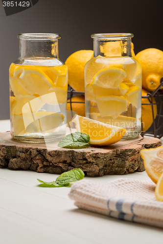 Image of Lemon and lime slices in jars