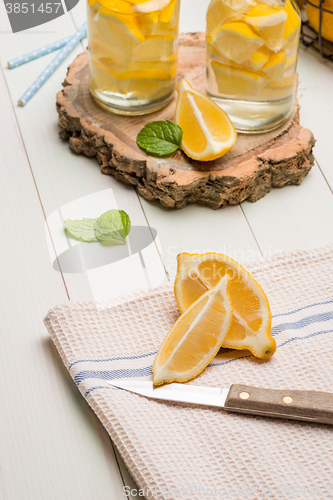 Image of Lemon and lime slices in jars