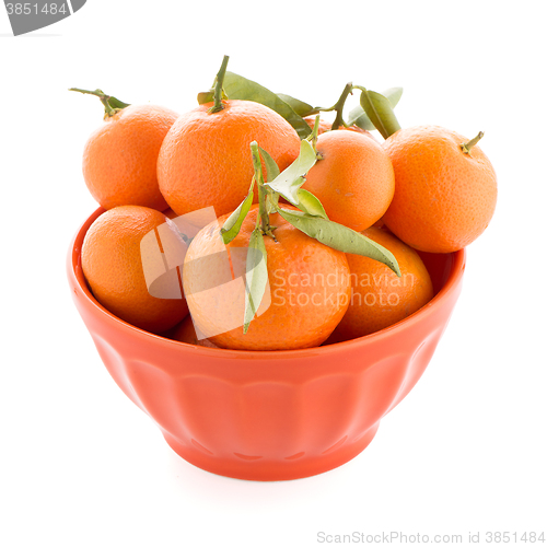 Image of Tangerines on ceramic orange bowl 