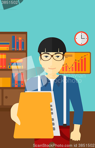 Image of Boss receiving file from employee.