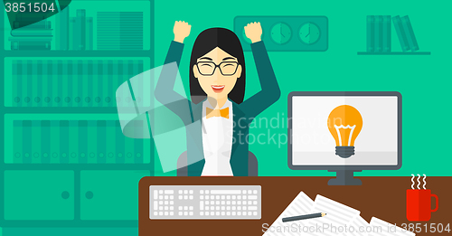 Image of Woman working at office.
