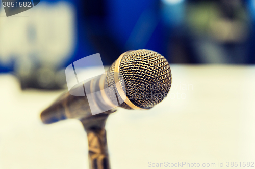 Image of microphone at recording studio or radio station