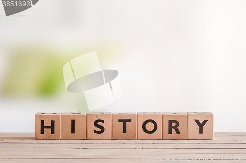 Image of History lesson sign on a classroom table