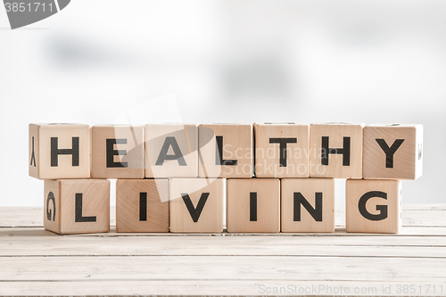 Image of Healthy living sign with wooden cubes