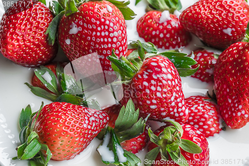 Image of Dish with strawberries and milk