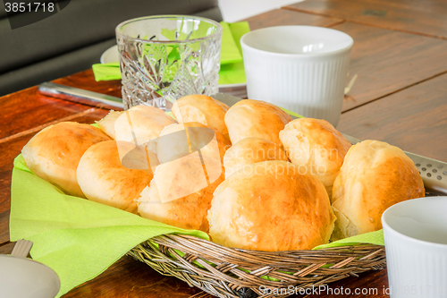 Image of Breakfast on a table with buns