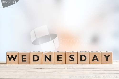 Image of Wednesday sign with wooden cubes