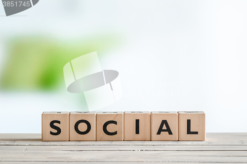 Image of Social sign on a wooden table