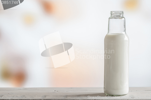 Image of Bottle of milk on a table