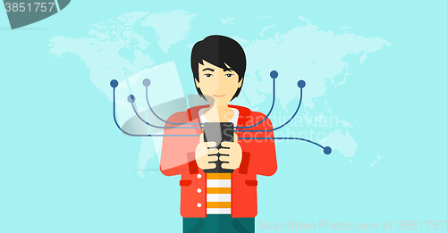 Image of Man using smartphone.