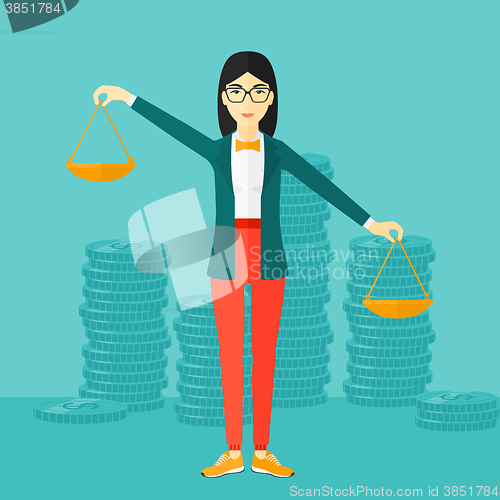 Image of Business woman with scales.