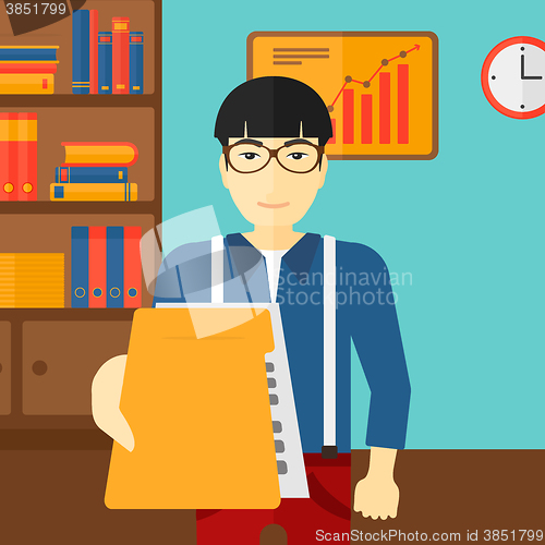 Image of Boss receiving file from employee.