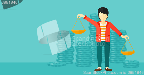 Image of Businessman with scales.