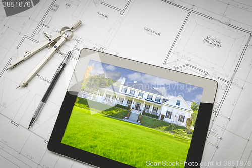 Image of Computer Tablet Showing House Image On House Plans, Pencil, Comp