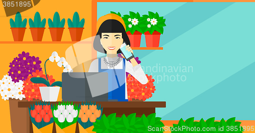 Image of Florist taking order.