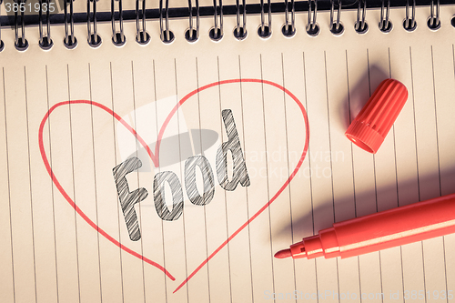 Image of Red heart with the word food