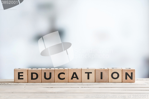 Image of Education sign on a wooden table