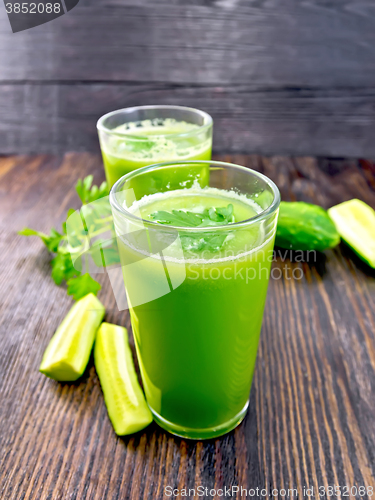 Image of Juice cucumber with parsley in two glass on board