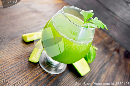 Image of Juice cucumber in wineglass on board