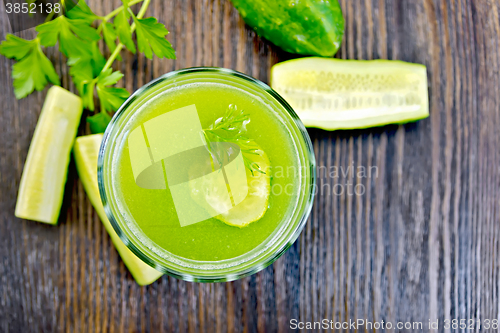 Image of Juice cucumber in glassful on board top
