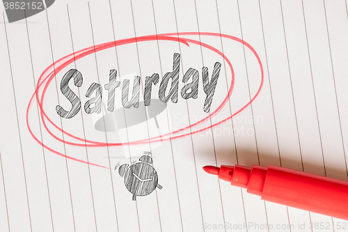 Image of Saturday note with a red marker