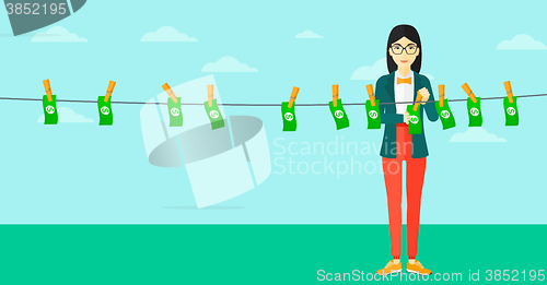 Image of Woman loundering money.