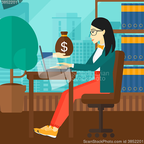 Image of Business woman working in office.