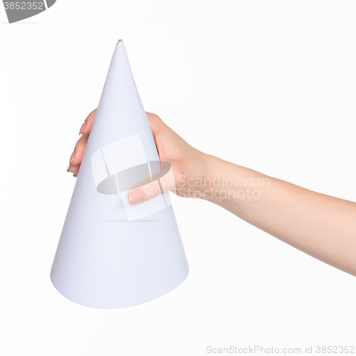 Image of The cone in female hands on white background