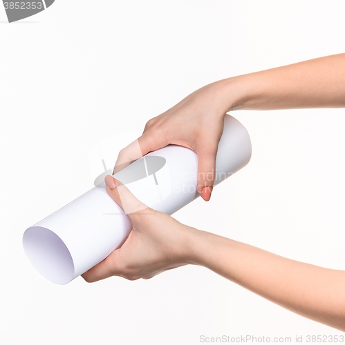 Image of The cylinder female hands on white background