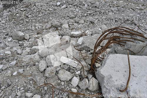 Image of Pieces of Metal and Stone are Crumbling from Demolished Building