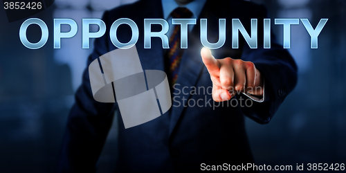 Image of Male Entrepreneur Pressing OPPORTUNITY