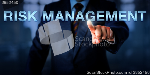 Image of Corporate Executive Pressing RISK MANAGEMENT