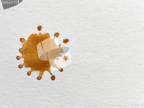 Image of coffee stain on white paper