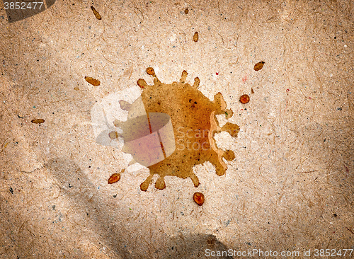 Image of coffee stain on old brown paper