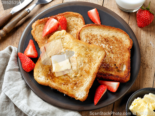 Image of French toast with butter and honey