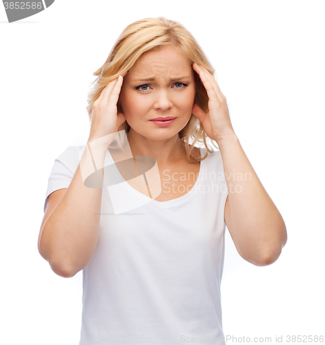 Image of unhappy woman suffering from headache