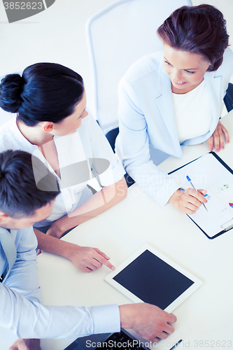 Image of business team having discussion in office