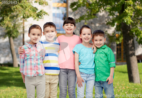Image of happy smiling little children hugging