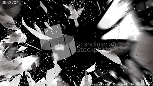 Image of Shattered pieces of glass on black with motion blur