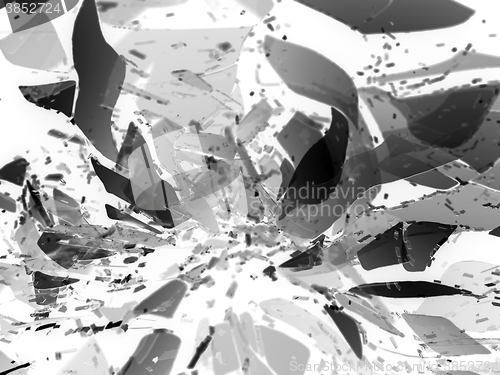 Image of glass breaking pieces on black shallow DOF