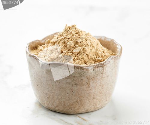 Image of bowl of maca powder