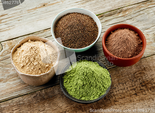 Image of bowls of various dried plant powders